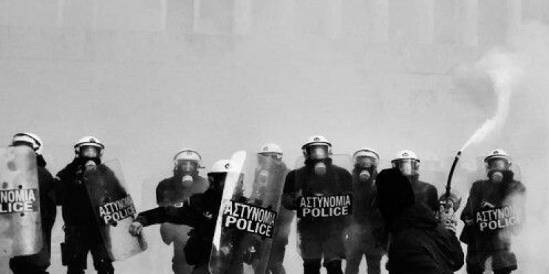 Boy with water jet vs cops R-Volution